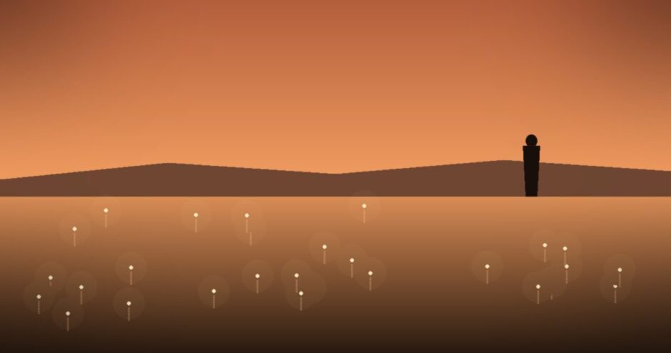 夕焼けのガンジス川に浮かぶ祈りの灯火